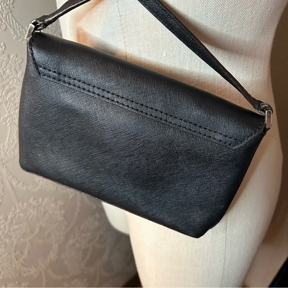 Kate Spade Small Black Newberry Lane Sally Leather Crossbody Brass Hardware Spin